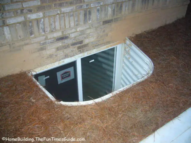 What are the building code requirements for basement egress windows?