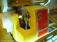 1955_Seeburg_Model_100_J_record_changer.JPG