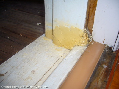 Filled_hole_with_water_putty_product.JPG