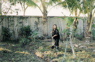 Sipaphay_working_in_the_backyard.jpg