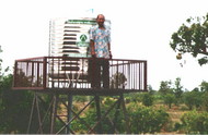 Sipaphays_husband_atop_the_water_tower.jpg