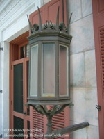 Tate_House_front_porch_medieval-like_sconce.JPG