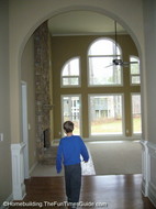 Tristan_checking_out_two-story_windows.JPG