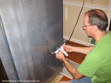 Use a downward motion to smooth in the clear top coat. brushing-top-coat-downward.JPG