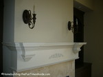 candle_sconces_flanking_mantle.JPG