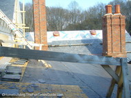 chimneys_stand_guard_amongst_roofing_activities.JPG