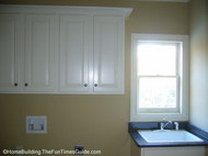 laundry_room_with cabinets_and_utility_sink.JPG