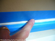 smooth_the_caulk_bead_into_the_crevice_with_your_finger.JPG