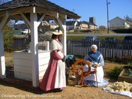 Root_House_Museum_yarn_spinner_in_period_clothing.JPG