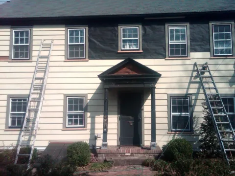 After improving the exterior of this house by replacing the siding.