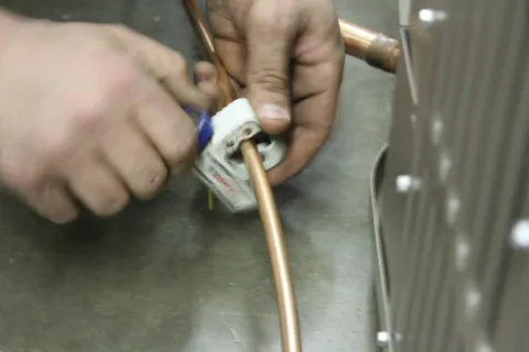 here's how to clean a condensate drain line and keep it clog-free