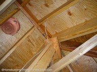 copper_cable_attached_to_rafters.JPG