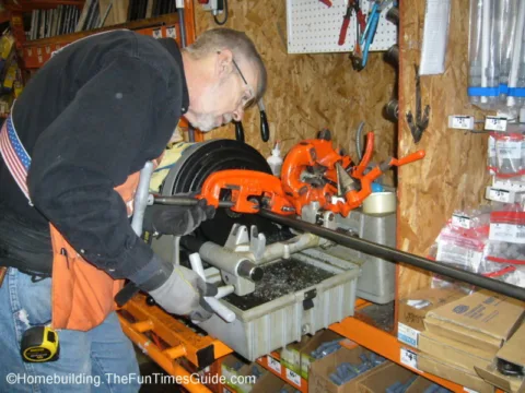 This is the experienced Home Depot employee cutting cast iron pipe. 