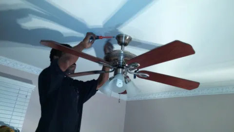 home improvement project installing ceiling fan