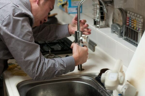 fixing broken kitchen sink sprayer