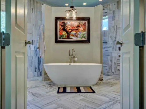 Do you really need a bathtub in your master bathroom? Here's a nice bathroom design that accommodates both - a large walk-in shower with 2 entrances, and a standalone tub.