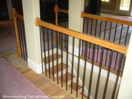 this is a beautiful effect created by the open staircase designs the builder used