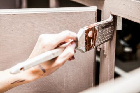when refinishing bathroom cabinets paint the interior and exterior for a professional look