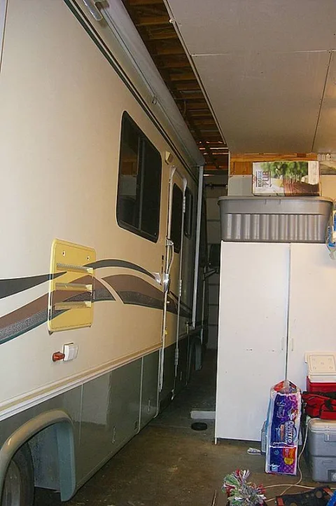 As you can see, there is only 2.5 feet of space on each side of this motorhome. The RV garage door is 10.5 feet wide and the motorhome (with mirrors in) is 10 feet wide. 