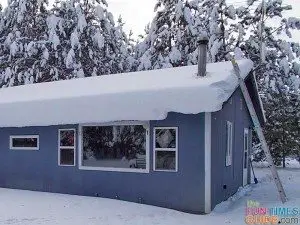snow-on-roof-with-metalbestos-chimney