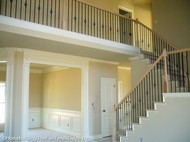 open staircase designs can include catwalks and balusters